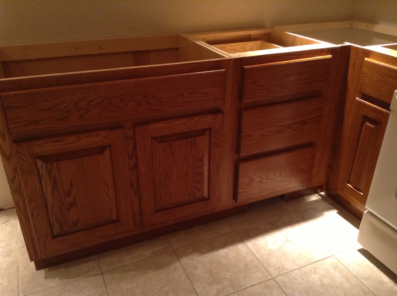 A completed and installed kitchen cabinet from Rawson Custom Woodworks, LLC.