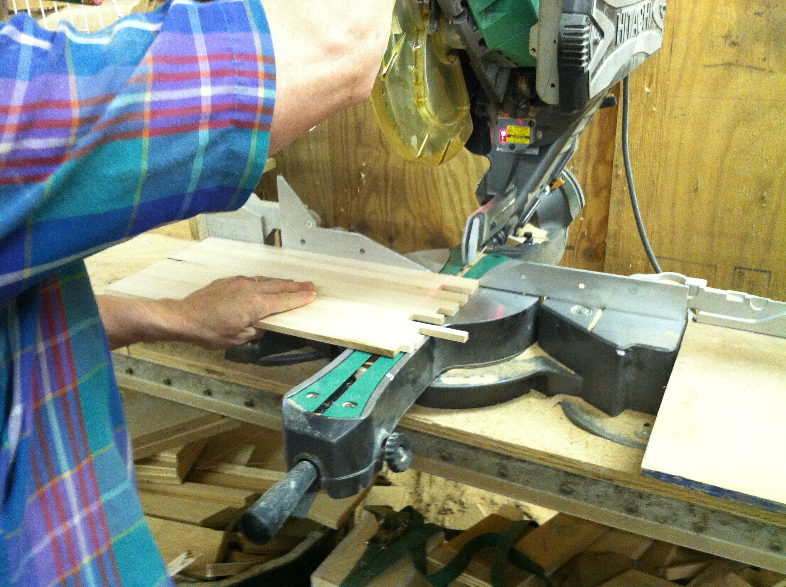 Maple wood glue up being squared on a wood chop saw