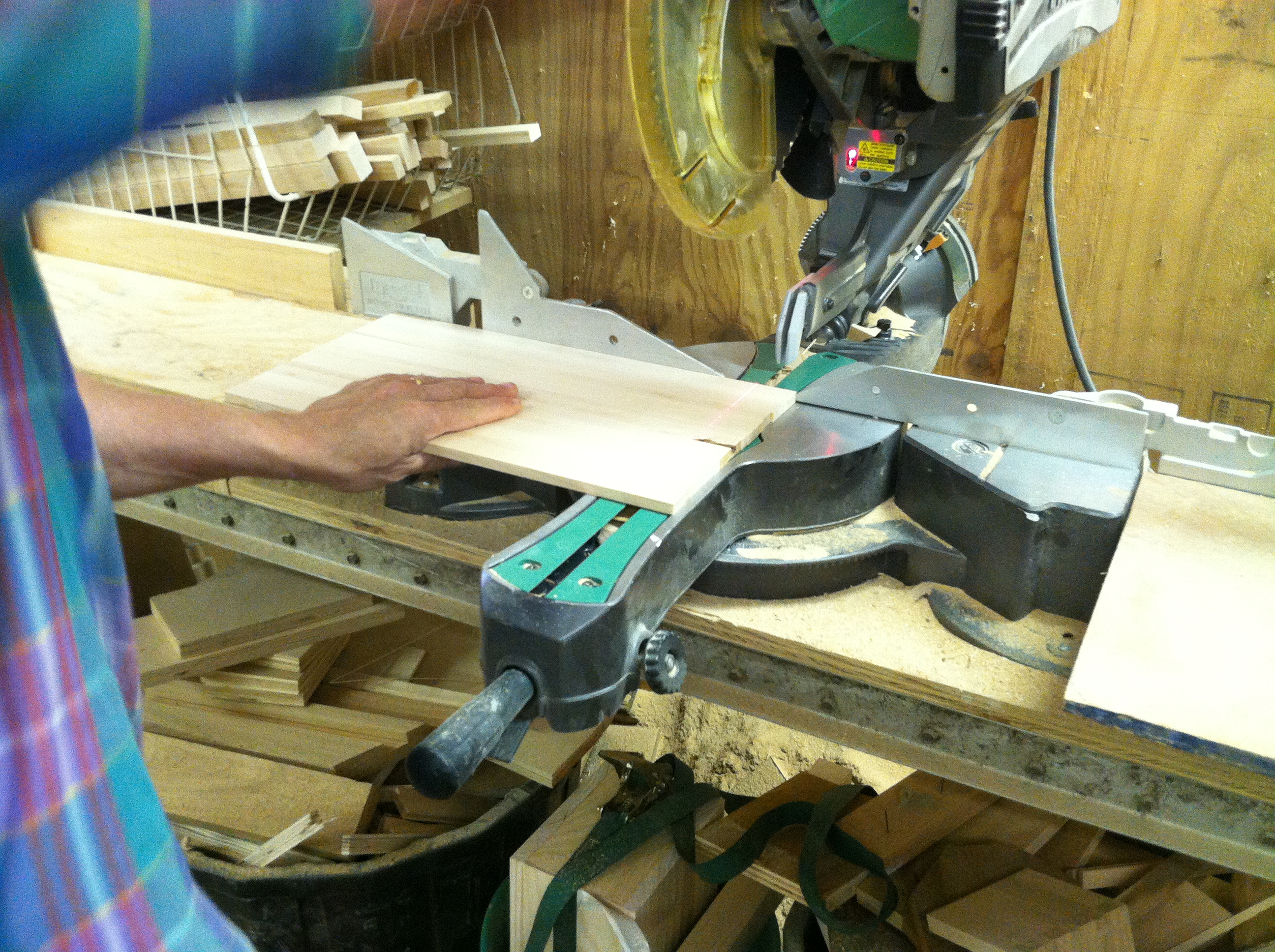 Maple wood glue up being squared on a wood chop saw